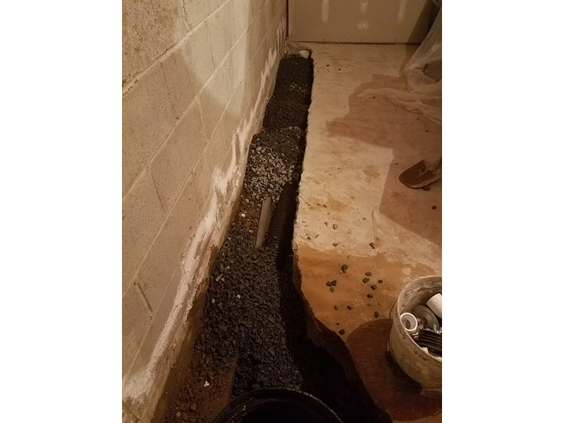 Installation of a french drain | Eco-Dry Waterproofing