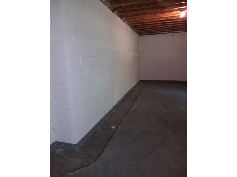 Interior french drain finished (3rd angle) | Eco-Dry Waterproofing