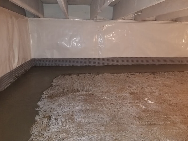Interior french drain finished in crawl space (2nd angle) | Eco-Dry Waterproofing