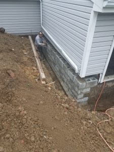 Exterior waterproofing - rebuilt foundation wall | Eco-Dry Waterproofing