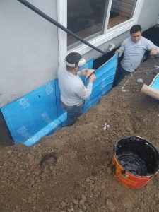 Exterior waterproofing - applying rubber membrane | Eco-Dry Waterproofing