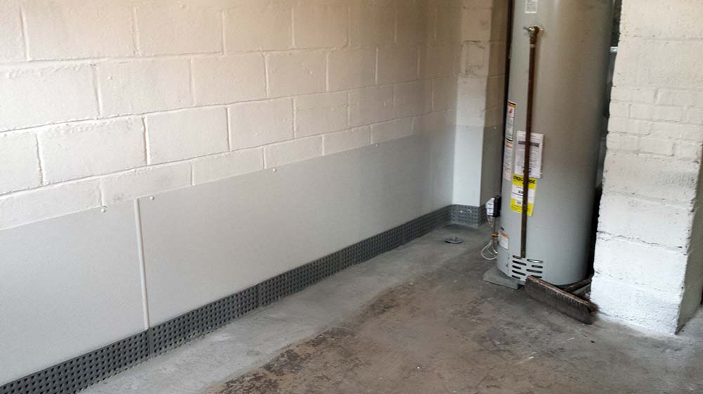 Finished french drain, glass board membrane, mold remediation on wall | Eco-Dry Waterproofing